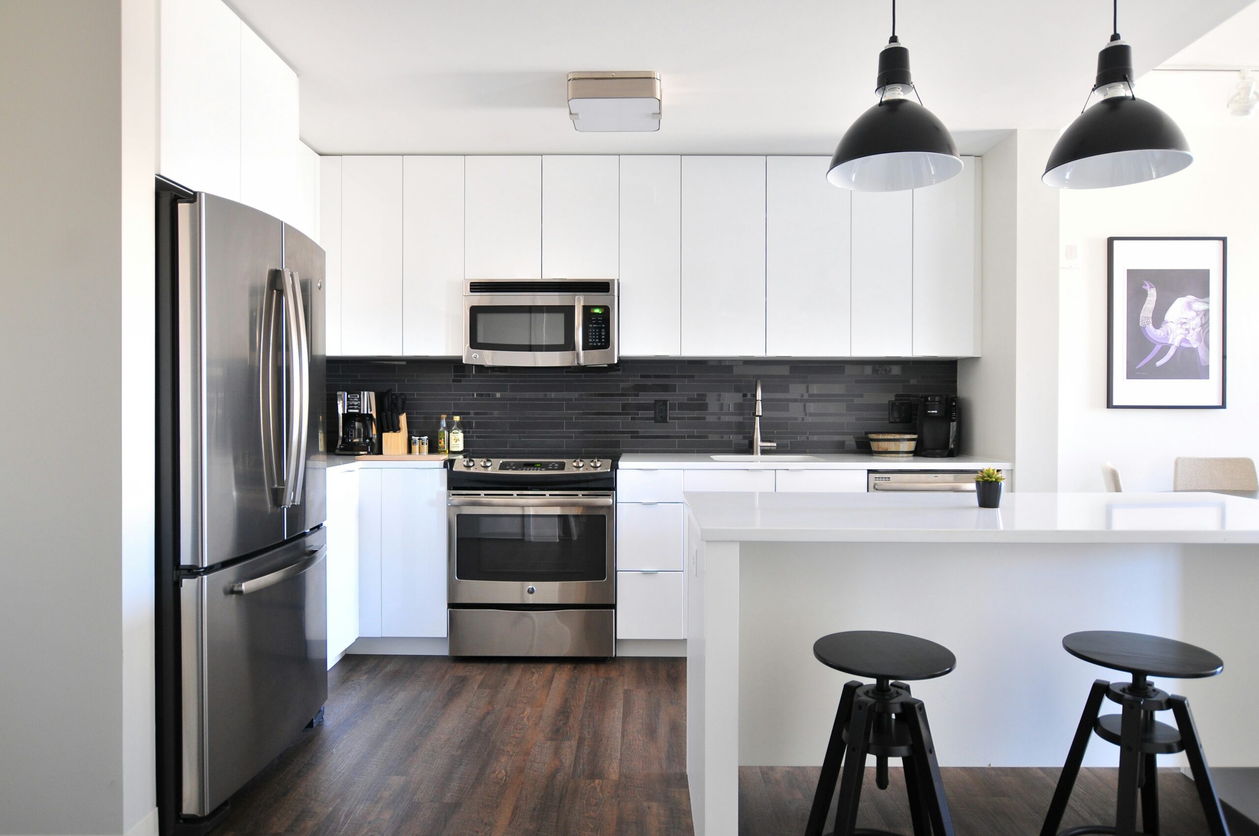 Stylish modern kitchen interior featuring a sleek stainless steel refrigerator